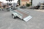 Vue arrière de la remorque ERDE LC 251 F avec ridelle ouvrante